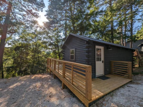 Cabin #6 with hot tub deck and sunset view at Loblolly Pines